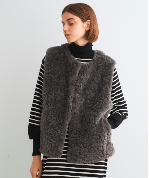 three dots（スリードッツ）の「アップサイクル エコファー ベスト