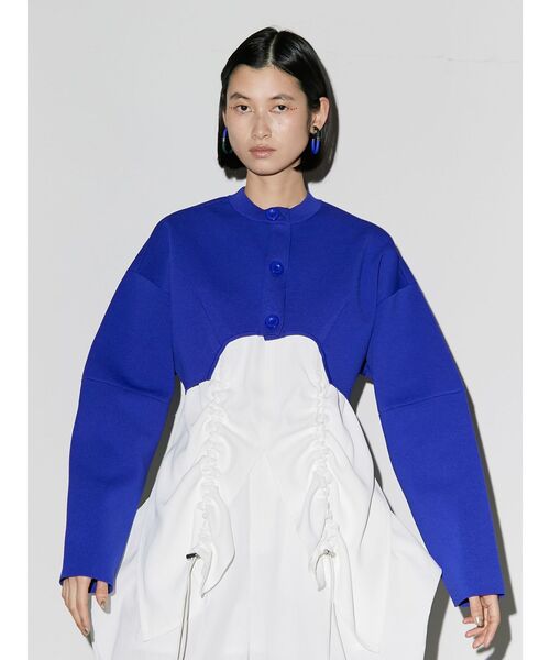 UN3D.（アンスリード）の「イレギュラーヘムショートニット