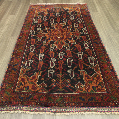 茶系のアンティークトライバルラグ ペルシアンバルーチ絨毯 オールド