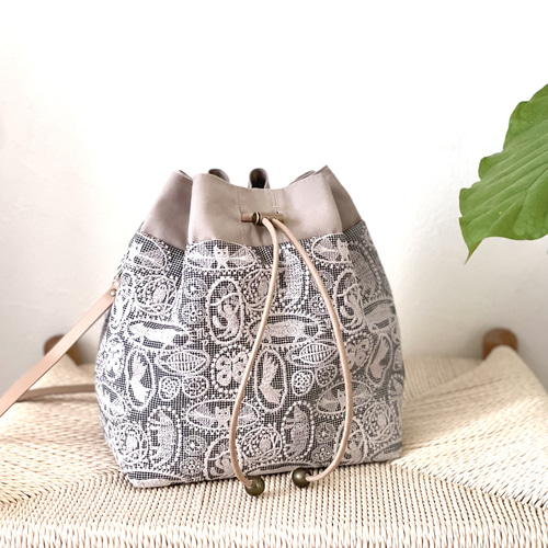 ⚮̈ミナペルホネン jungle relief シプリバッグ 巾着ショルダーバッグ