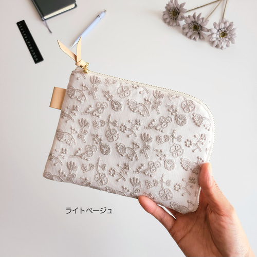 ミナペルホネン×check&stripeのL字ファスナーポーチ│母子手帳ケース