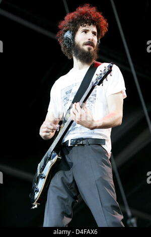 Guitarist Brad Delson of the band Linkin Park performs in concert