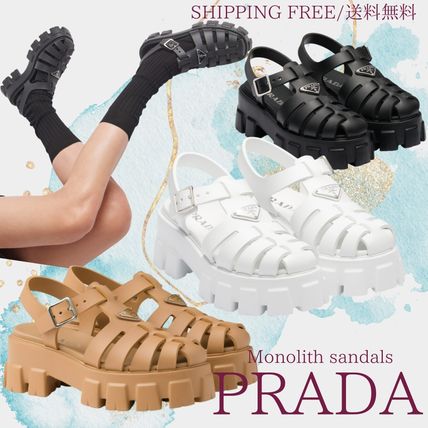 ホワイト（白）系 PRADA(プラダ) サンダル・ミュール(レディース