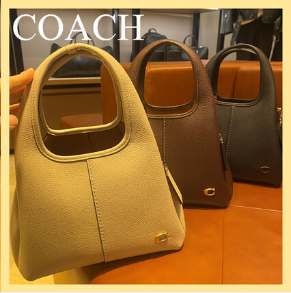 ブラウン（茶色）系 Coach(コーチ) ハンドバッグ(レディース