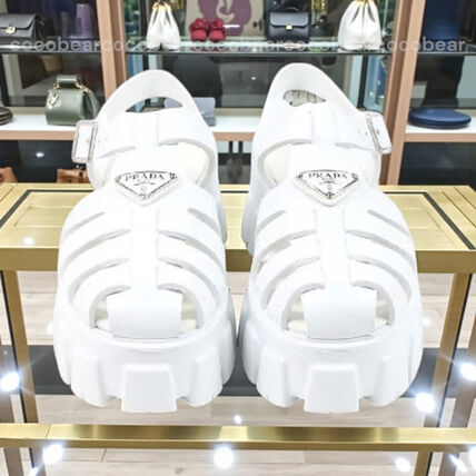 ホワイト（白）系 PRADA(プラダ) サンダル・ミュール(レディース