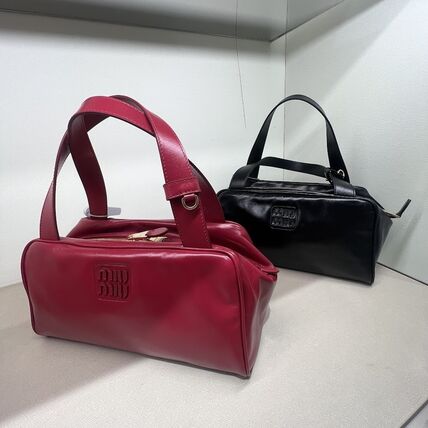 レッド（赤）系 MiuMiu(ミュウミュウ) ハンドバッグ(レディース