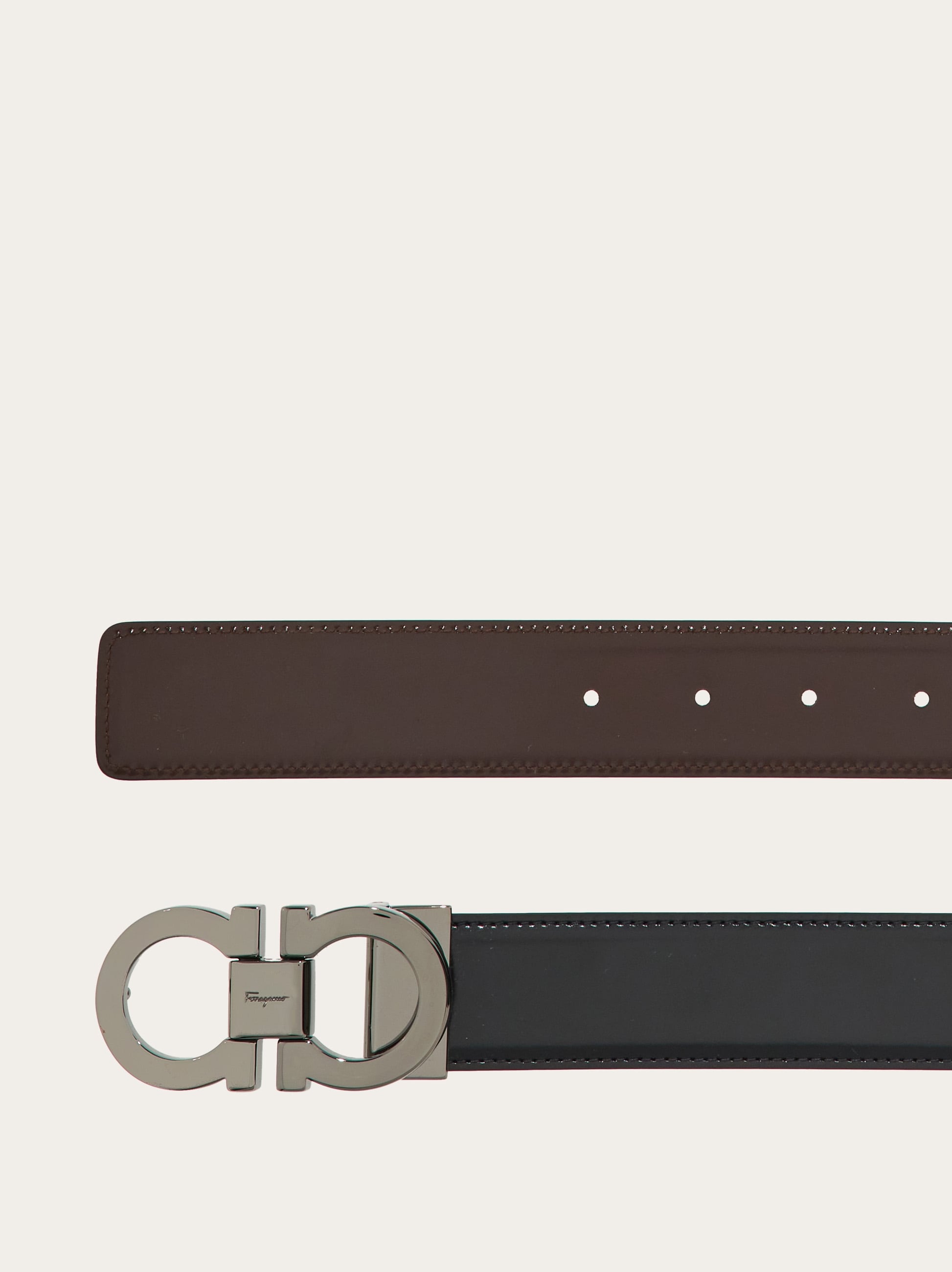 Reversible and adjustable Gancini belt - Men | Ferragamo