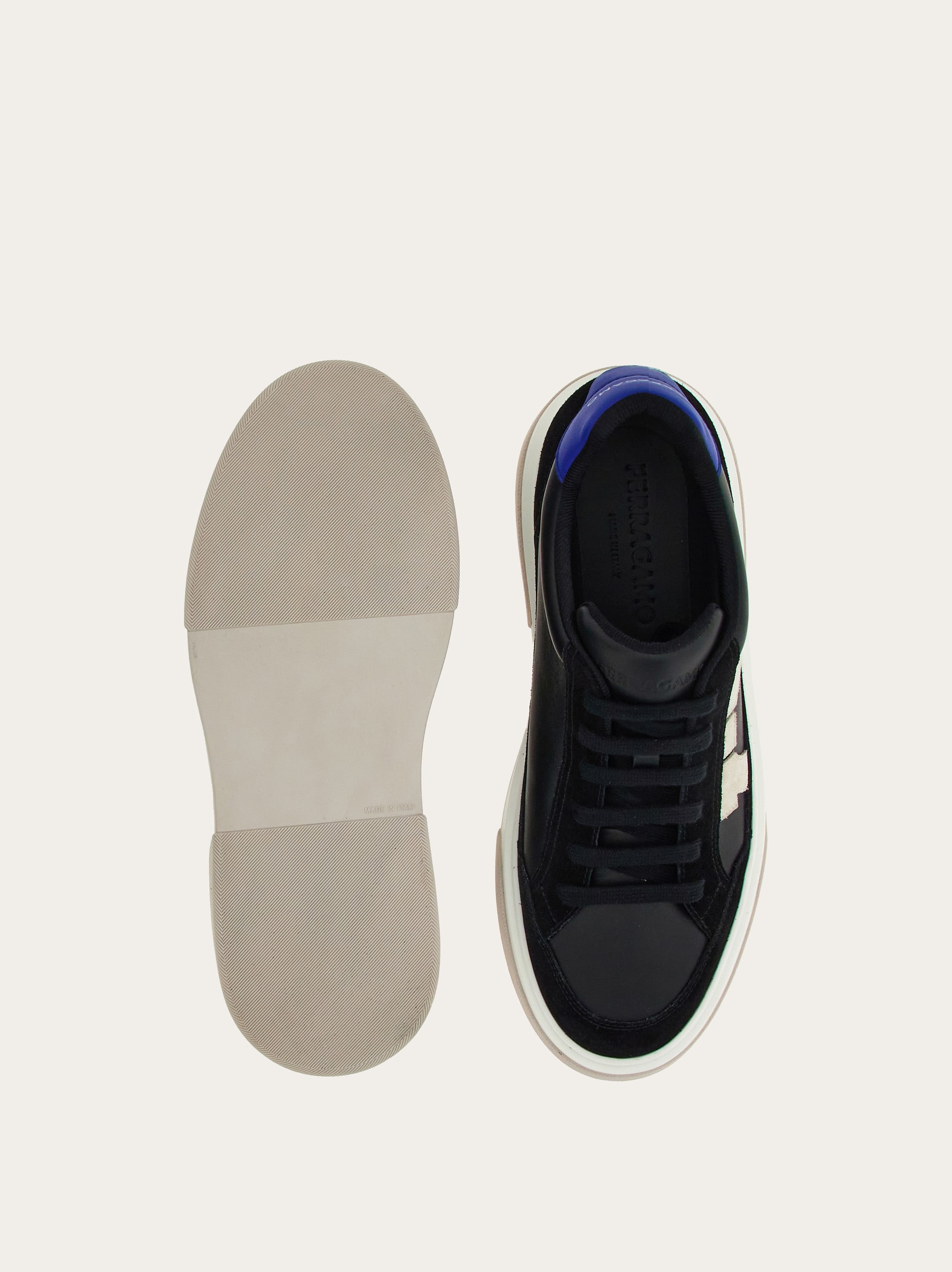 Low-top sneaker with Gancini detail - Men | Ferragamo