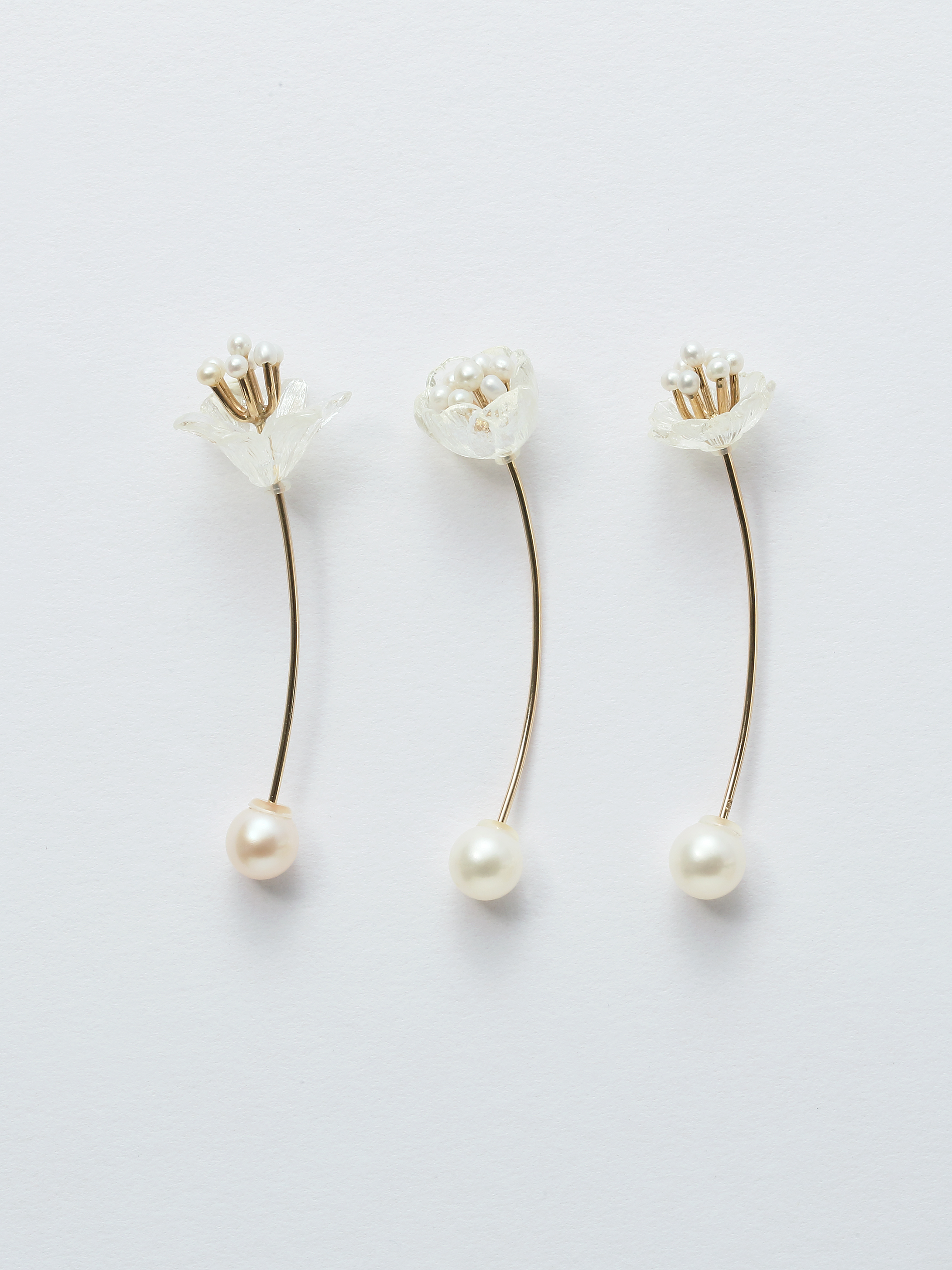simmon official WEB SHOP | CLEAR FLOWER LONG PIERCED EARRING