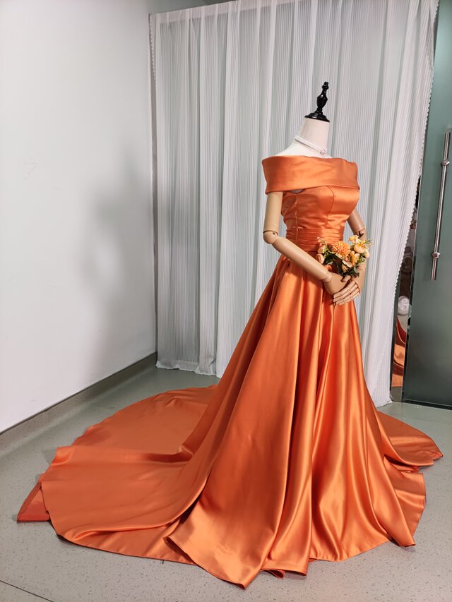パーティードレス オレンジ オフショルダー 光沢サテン リボン