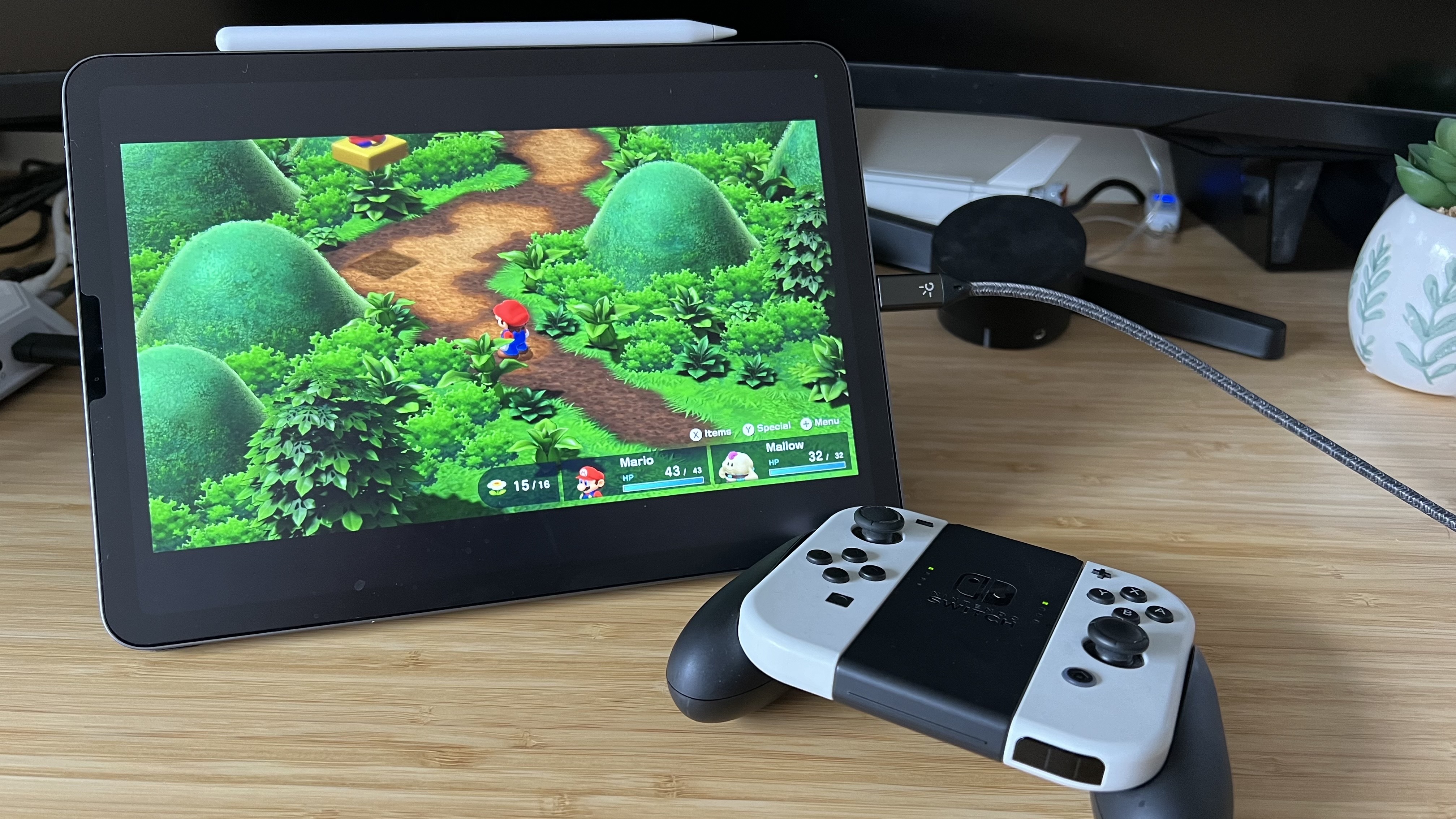 I use this cheap dongle to play Nintendo Switch on my iPad - and