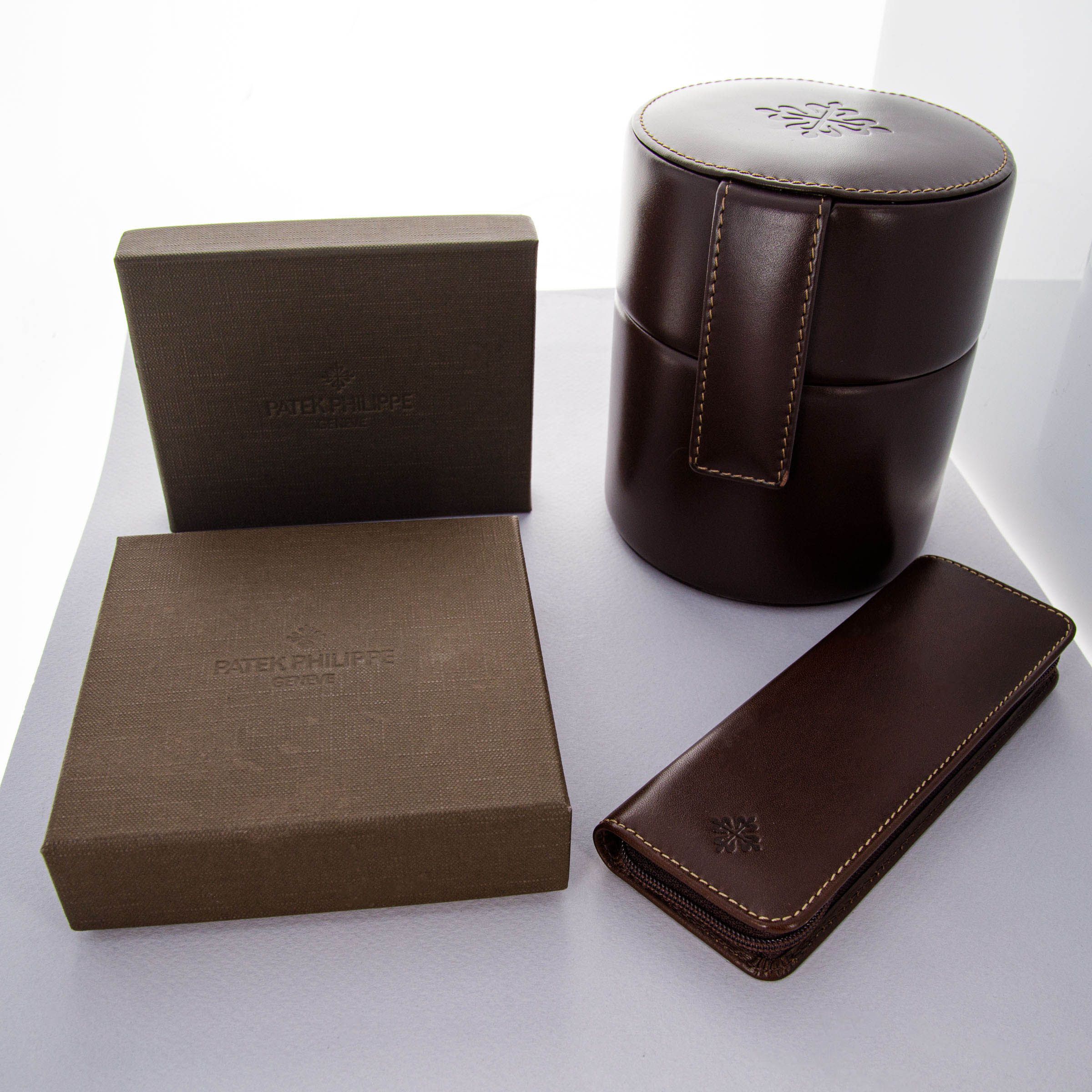 Patek Philippe Watch Winder, Desk Magnifier, Pen and Pencil Set