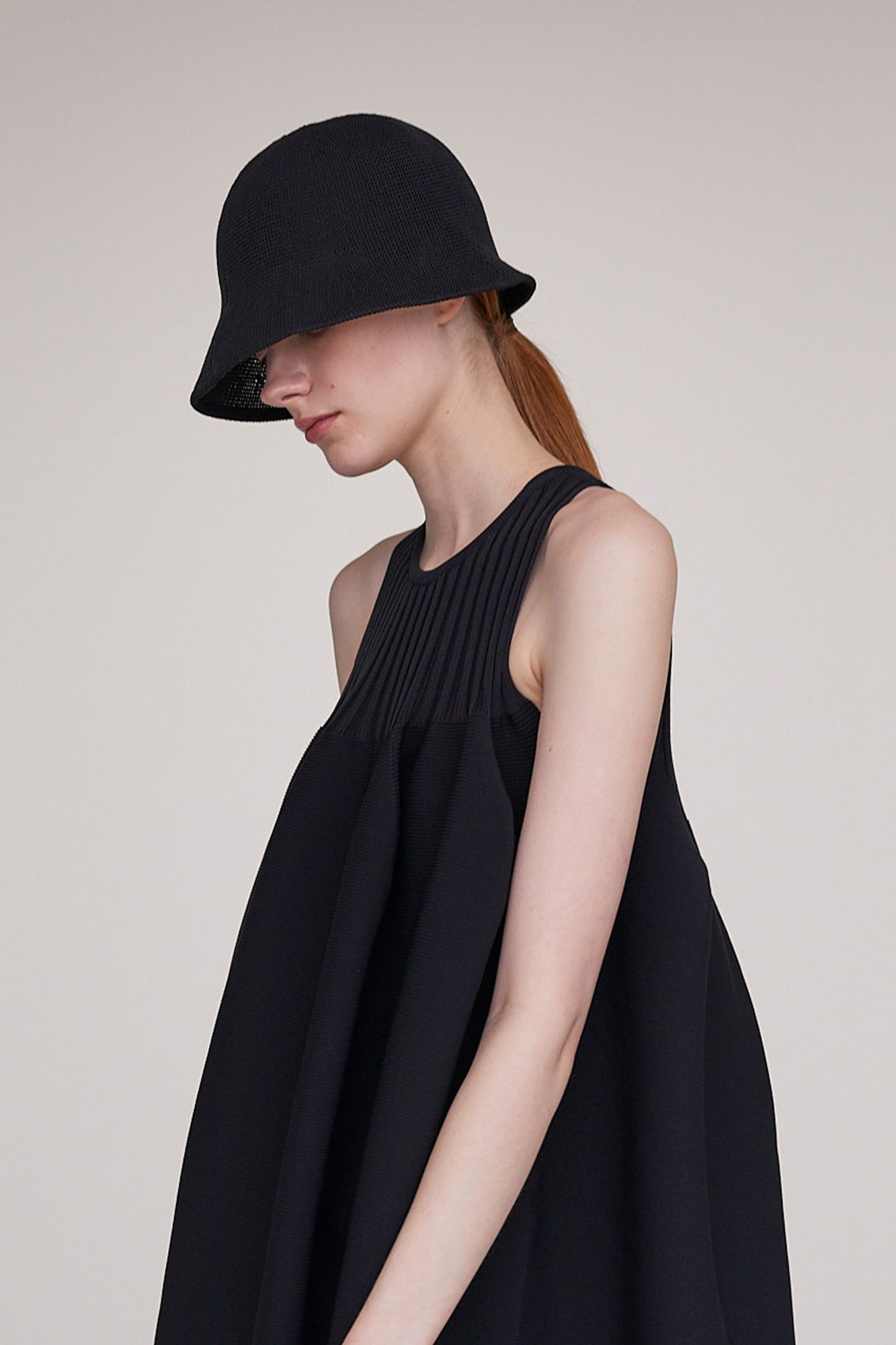 MESH KNIT ASYMMETRIC HAT