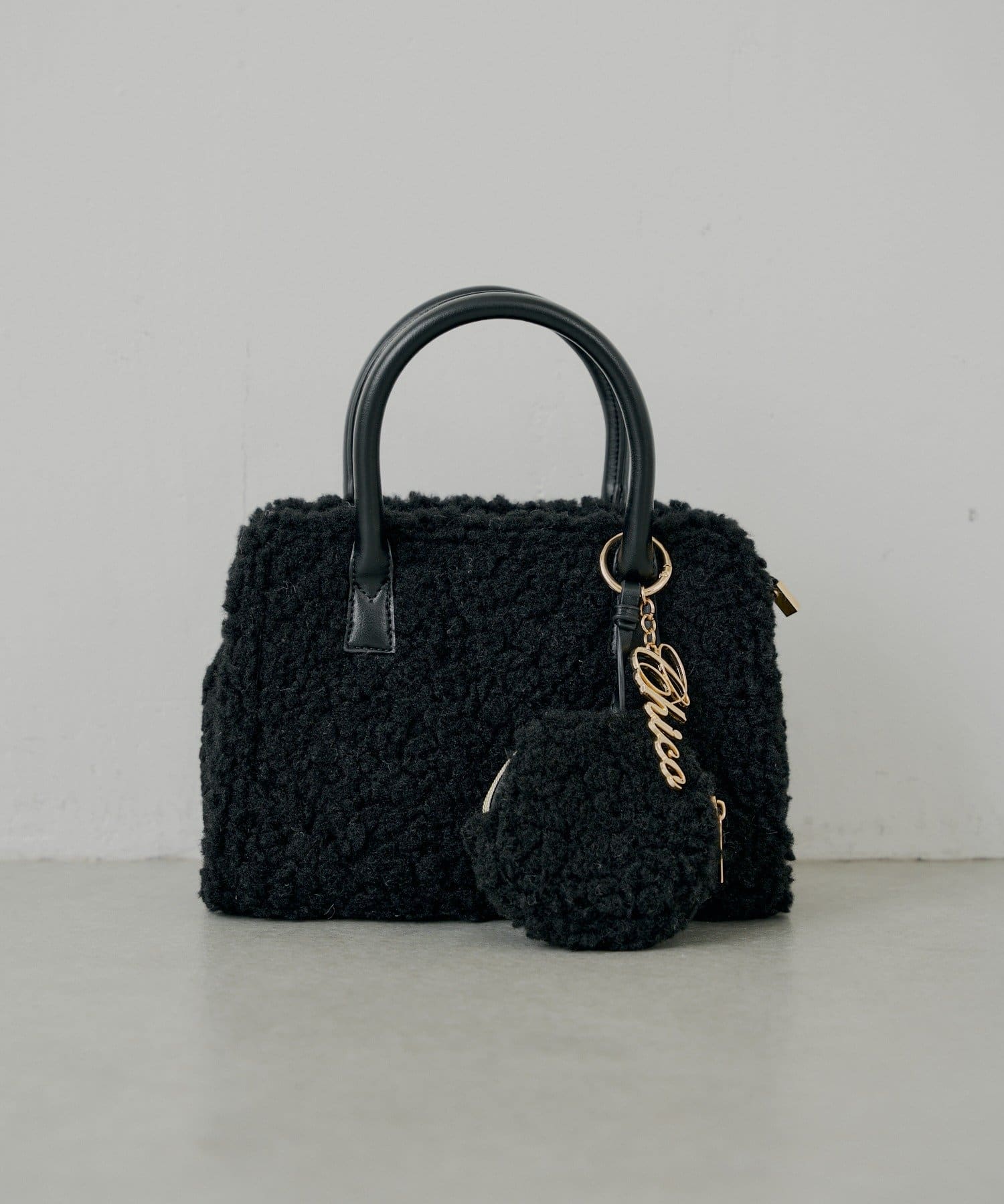 ロゴチャーム付きスエードムートンバッグ | Chico(チコ)レディース