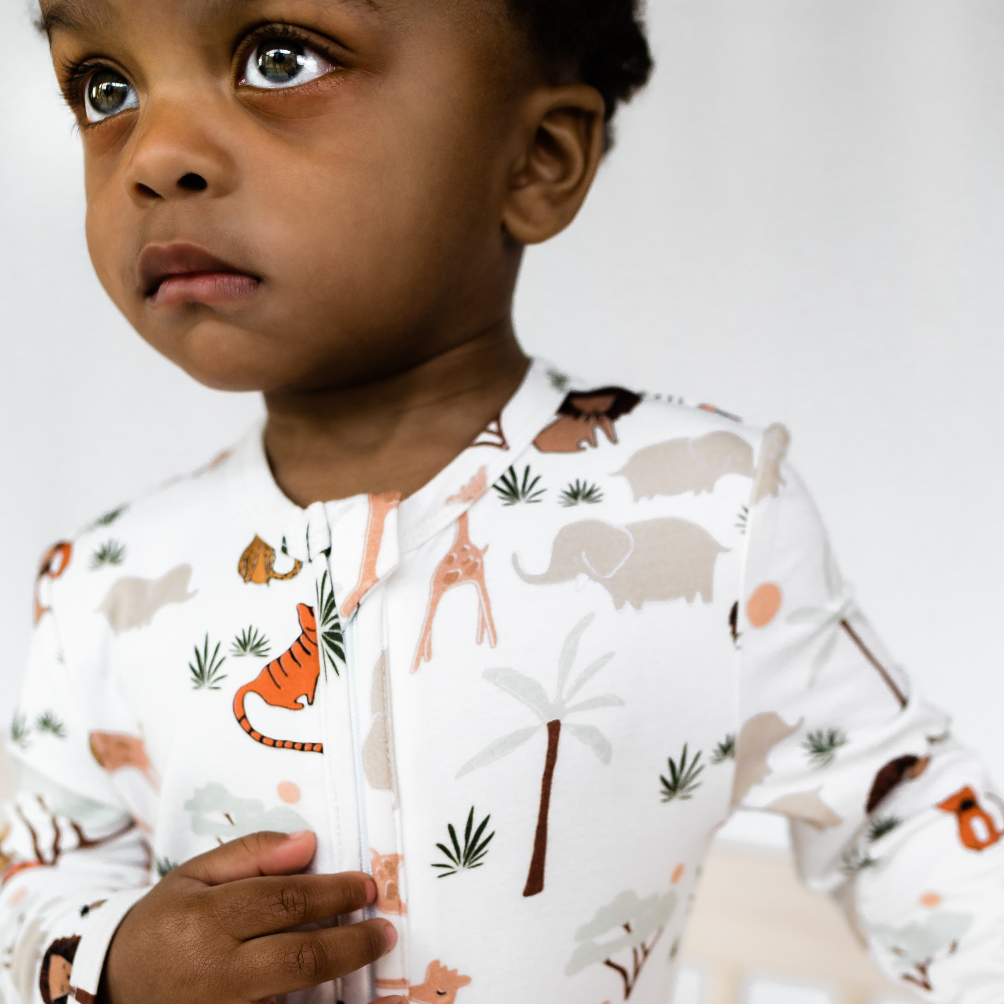 bamboo baby pajama zippie - safari animal print – Coco Beans
