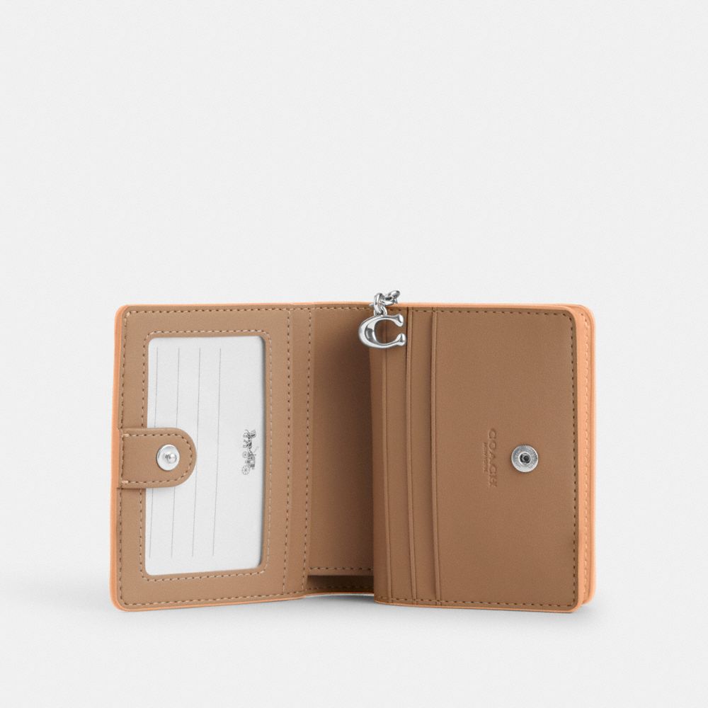 公式】コーチアウトレット | スナップ ウォレット・シグネチャー ジャ
