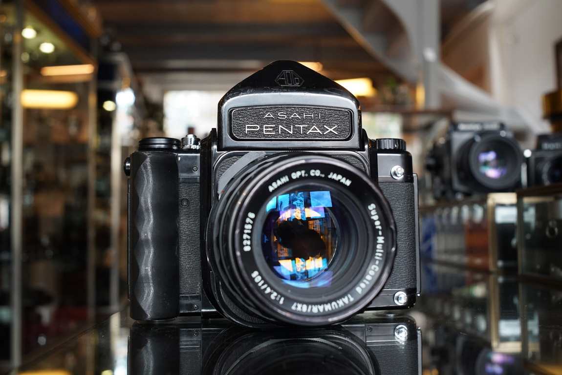 Pentax 6x7 + Super-Multi-Coated Takumar 105mm f/2.4 - Fotohandel