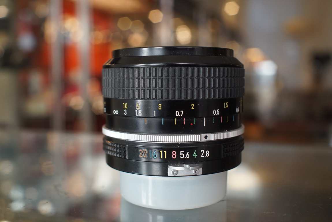 Nikon Nikkor 24mm F/2.8 Pre-Ai lens - Fotohandel Delfshaven / MK