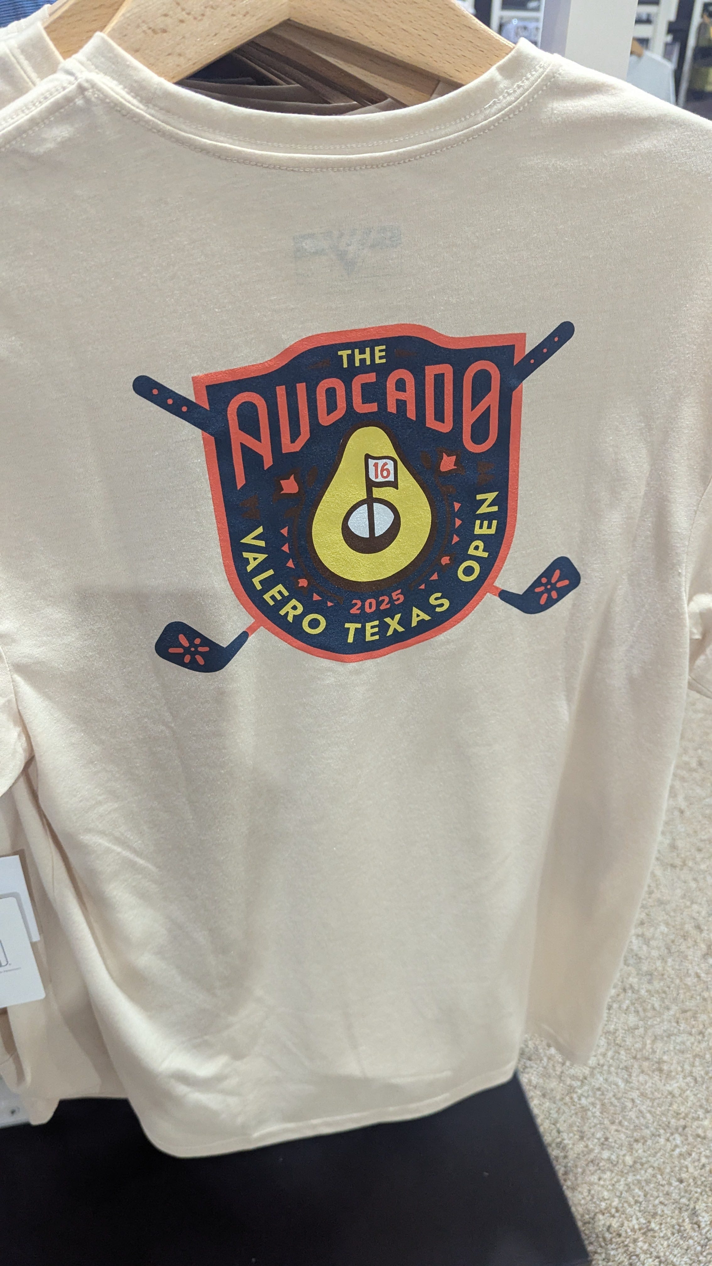 TPC San Antonio's 16th hole, known as the avocado, leads merch tent