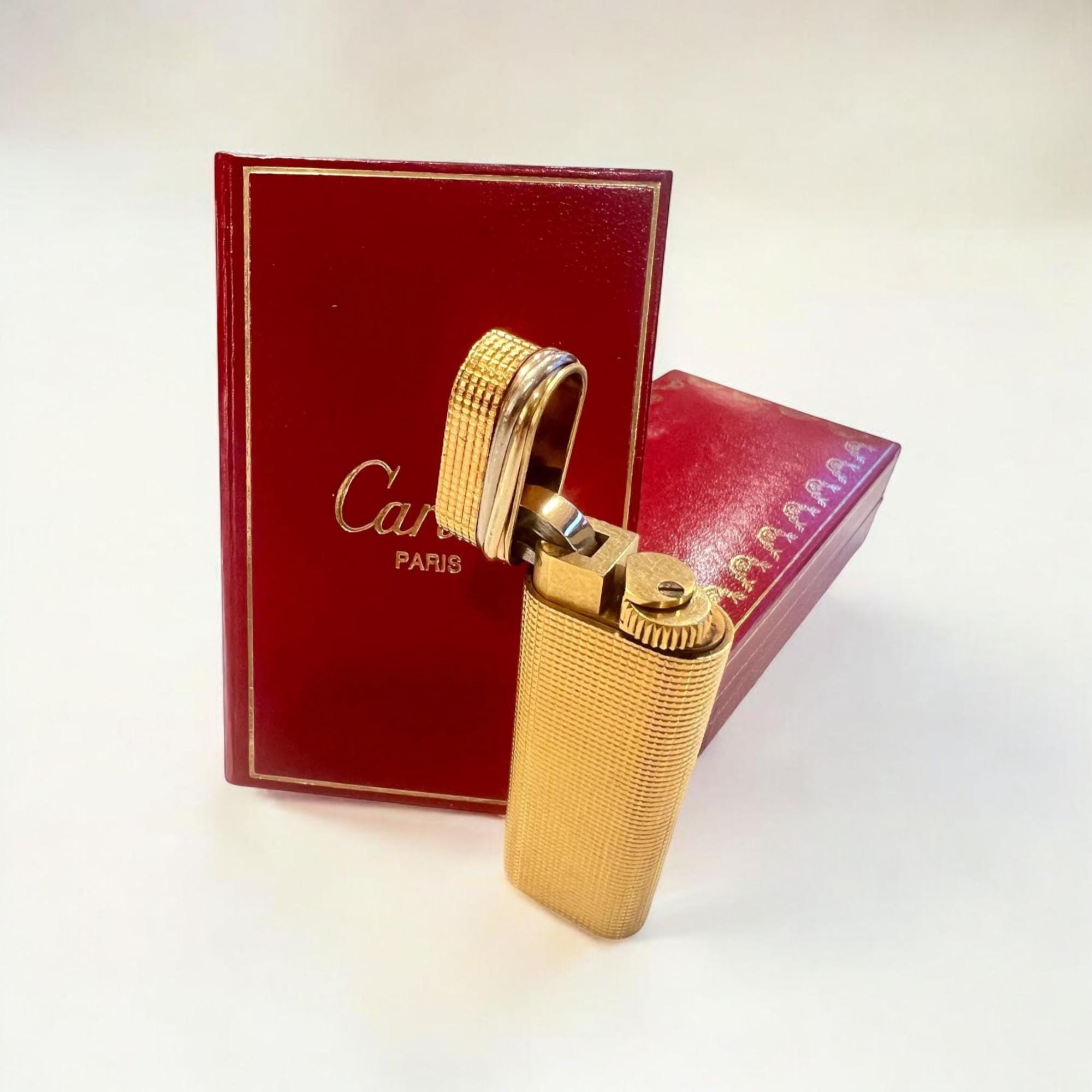 オリジナルのヴィンテージ カルティエ ライター、金メッキ、トリニティ