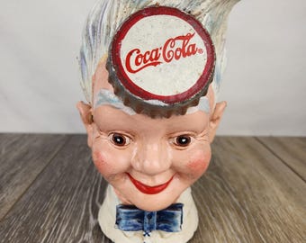 Cast Iron Sprite Boy Head COCA COLA Coin/piggy Bank Coke
