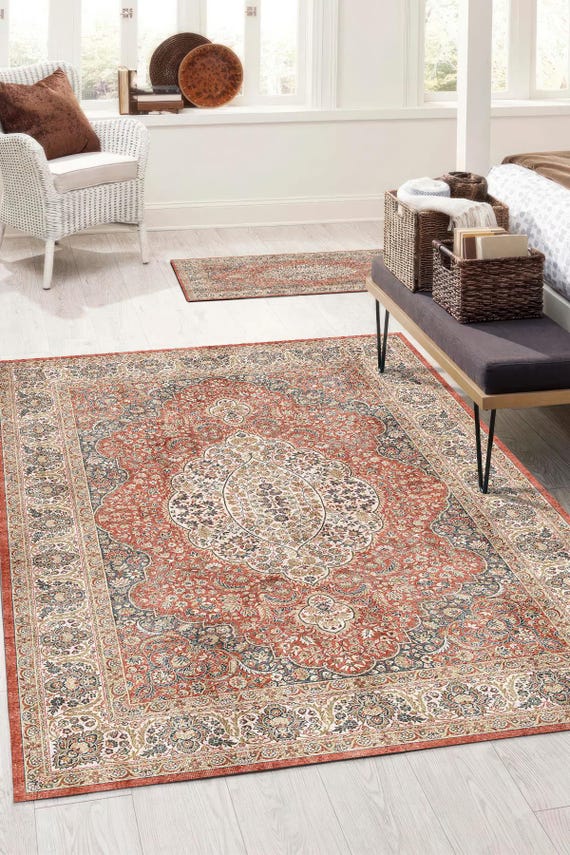 シャビーなローズピンクとベージュのメダリオンラグ ヴィンテージラグ