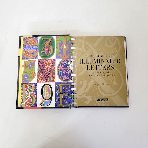 アート・デザイン・音楽 The Bible of Illuminated Letters Amazon