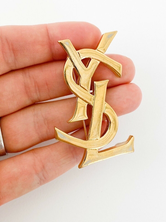 ヴィンテージ YSL イヴ・サンローラン ロゴ ブローチピン - ゴールド