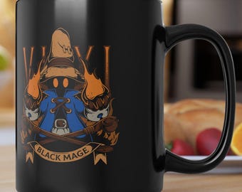 タンタラス劇団エンブレム ブラック マグカップ (11 オンスまたは 15