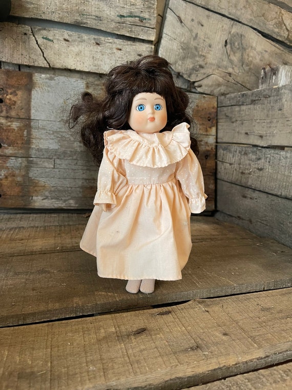 Vintage Blue Eyed Black Haired Porcelain Doll - Etsy