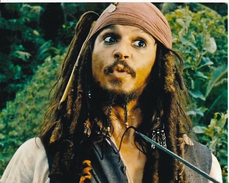 ジョニー・デップのサイン入り8x10パイレーツ・オブ・カリビアン