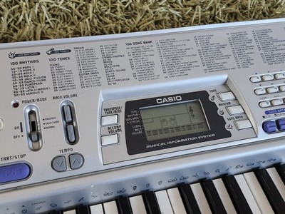 Casio CTK-496 Electronic Keyboard with 61 Full-Size Keys