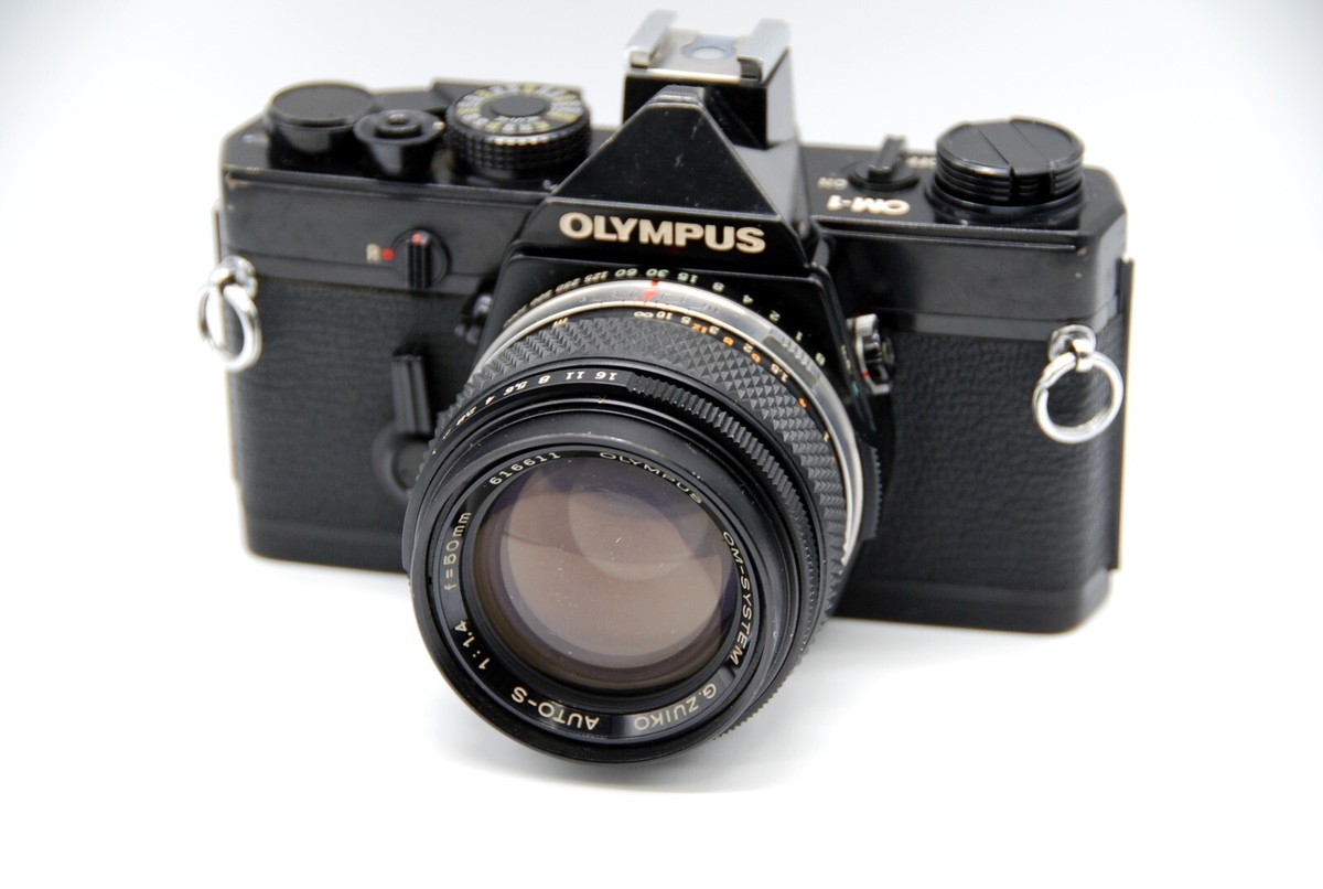 Olympus OM1 OM-1 Film SLR Camera with lens G.Zuiko 50mm F1.4 Lens