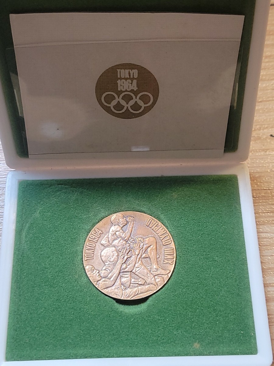 Tokyo Olympic game memorial vintage copper medal year 1964 in a