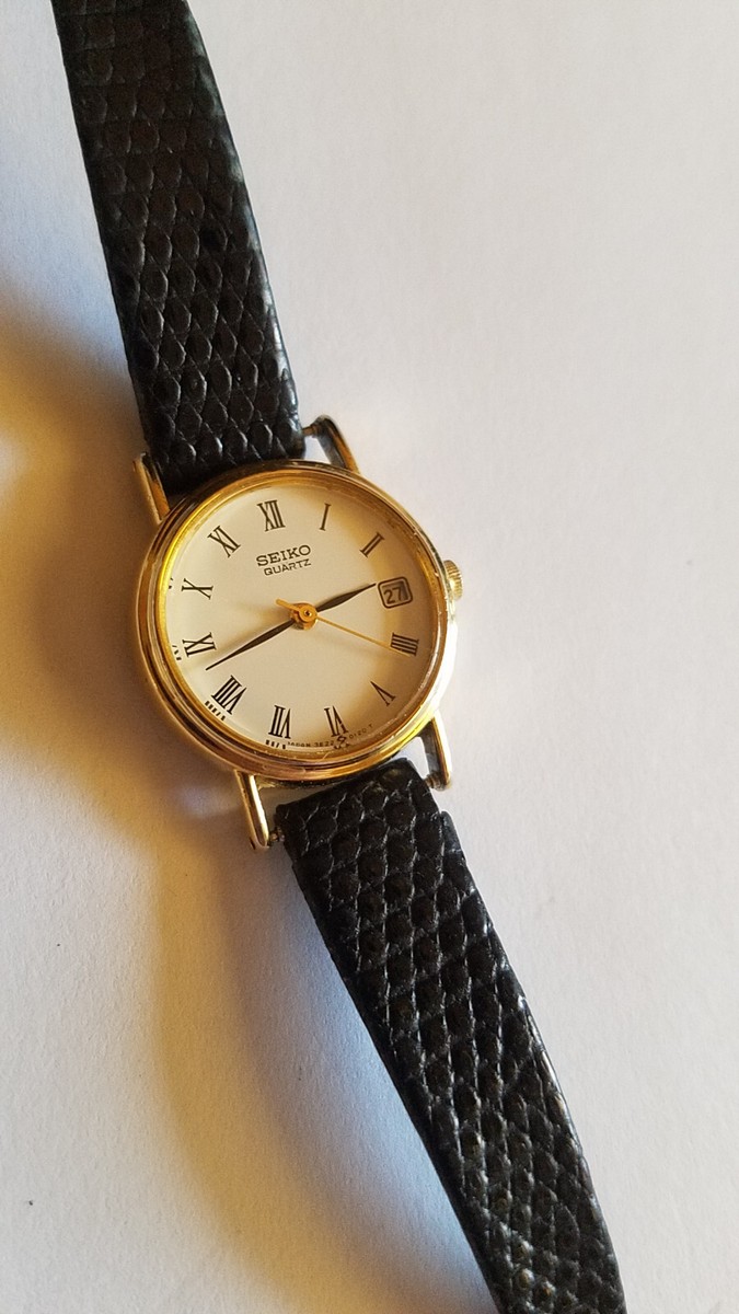 Seiko Womens 3E22-0060 Quartz Watch Leather Band White Dial Date