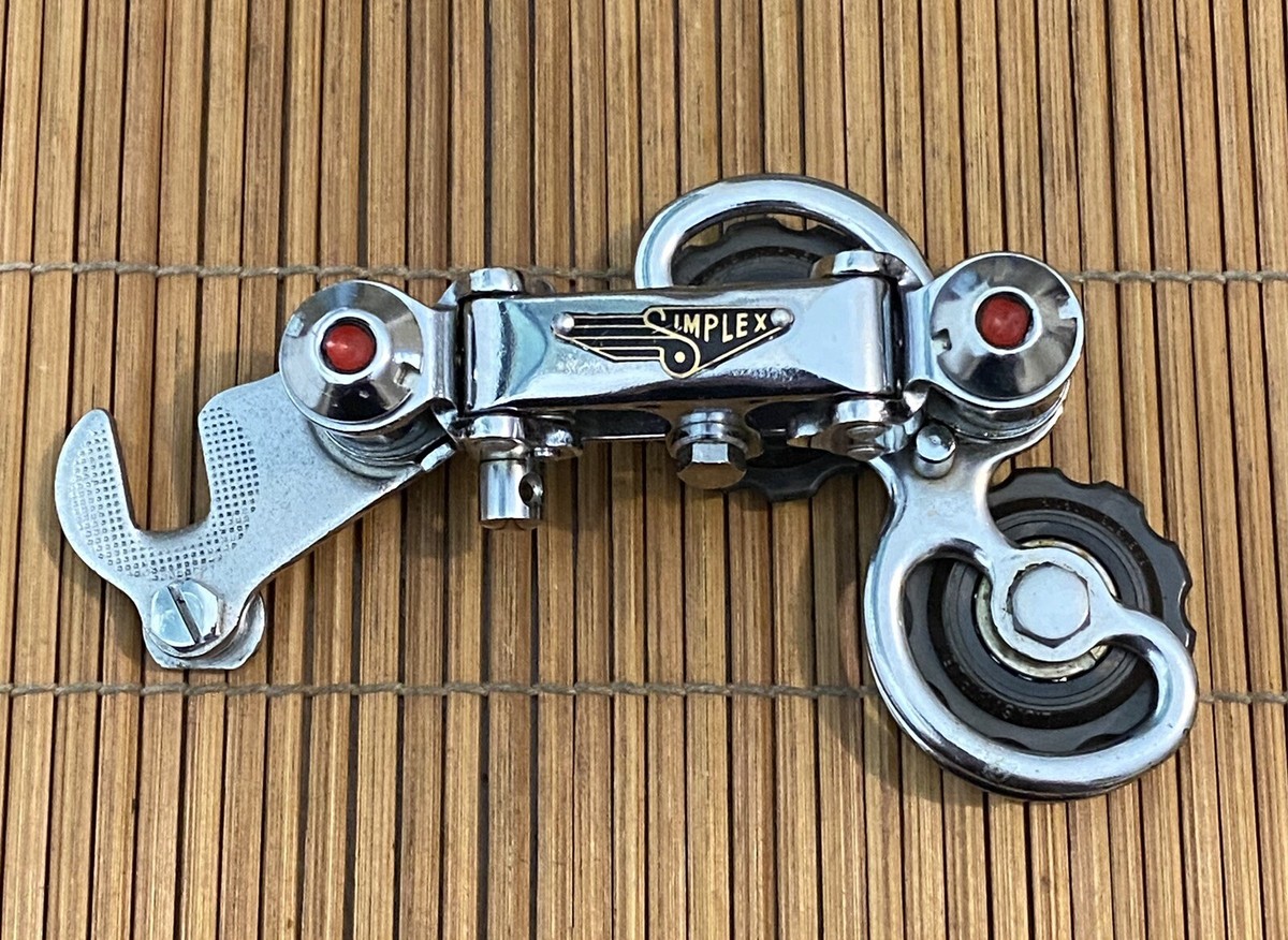 NOS Vintage Simplex Juy 61 Riveted Badge Rear Derailleur and