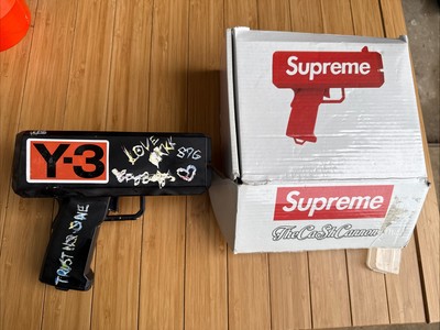 Supreme/CashCannon Money Gun. Includes custom Supreme $1000 Bills