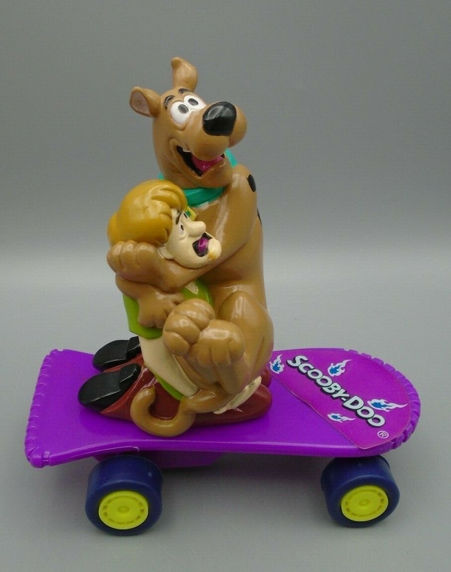 Vintage Warner Bros Scooby Doo & Shaggy on a Pull Back Skateboard