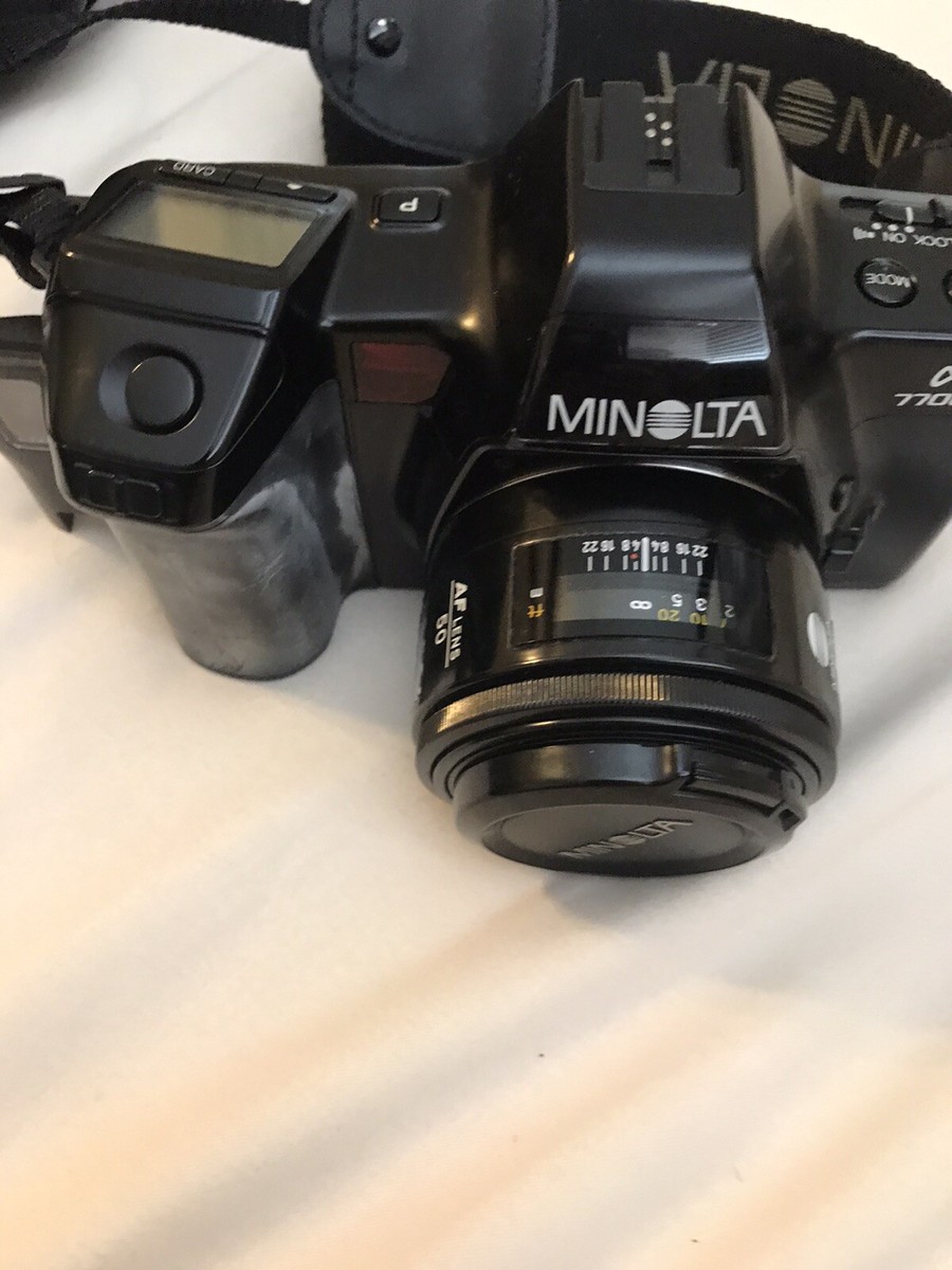 Minolta a7700i 35mm SLR film camera with AF Lens 50 And Two Cards