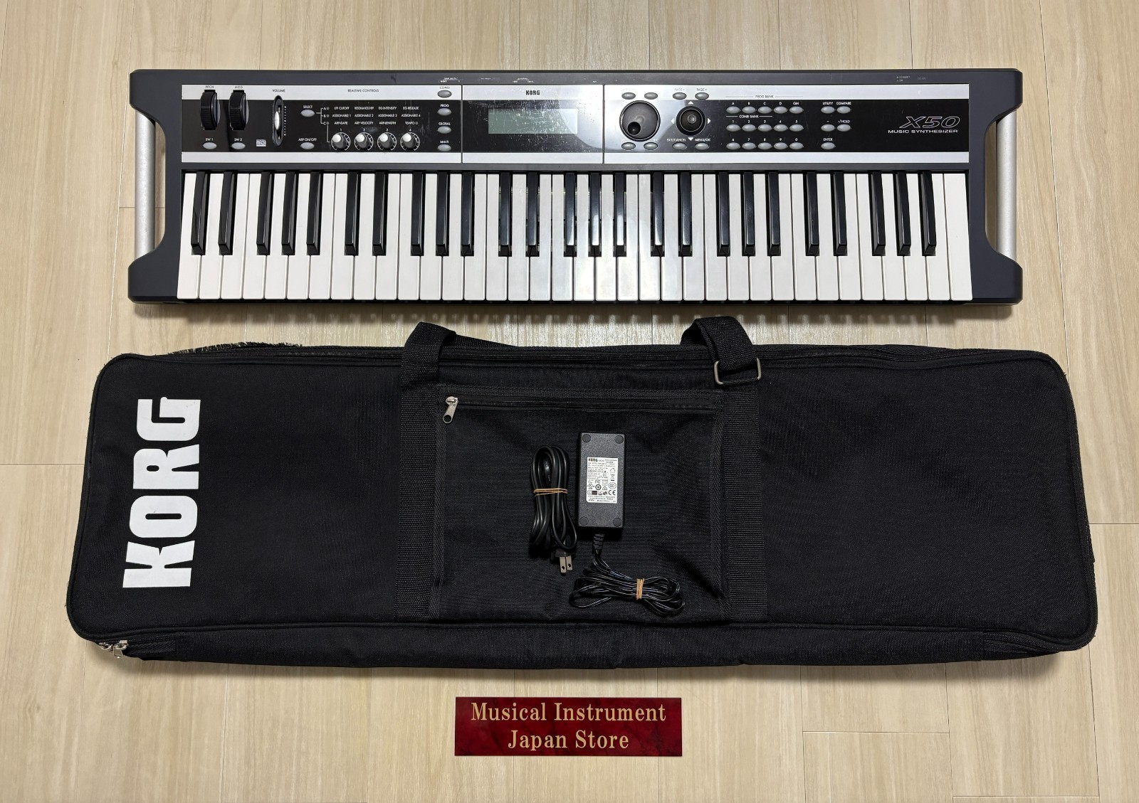 Korg X50 61-Key Keyboard Synthesizer with Soft Case and Adapter