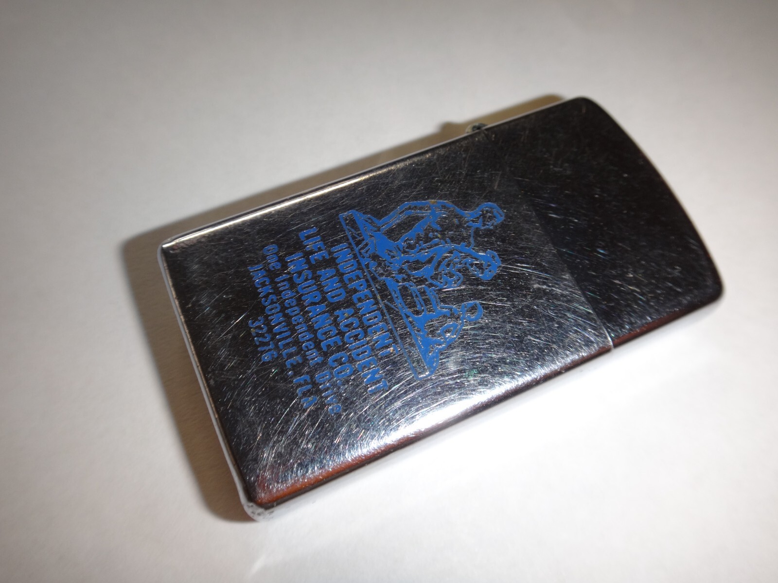 Year 1976 Zippo Slim Lighter INDEPENDENT LIFE & ACCIDENT INSURANCE