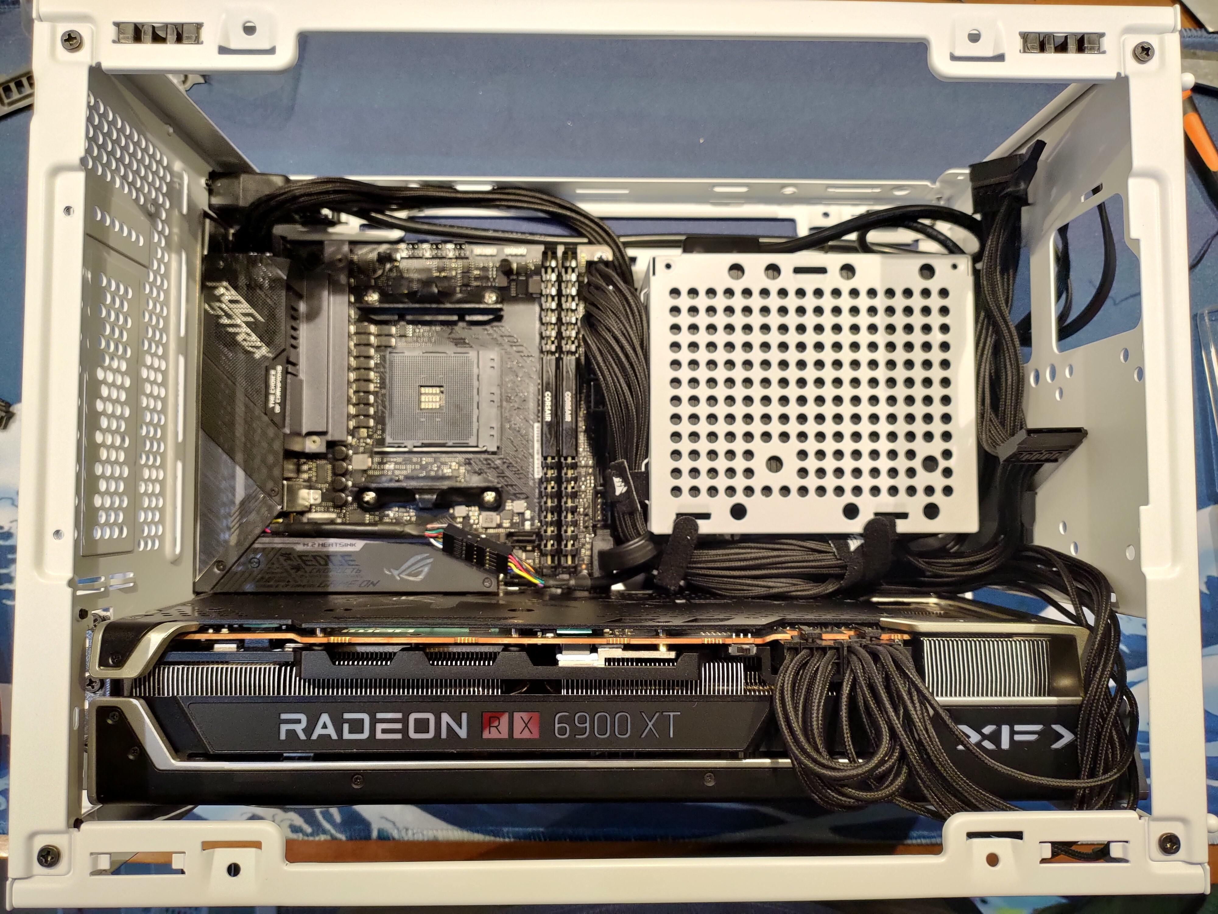 XFX Speedster Merc 319 inside the NR200. This card is 340mm long