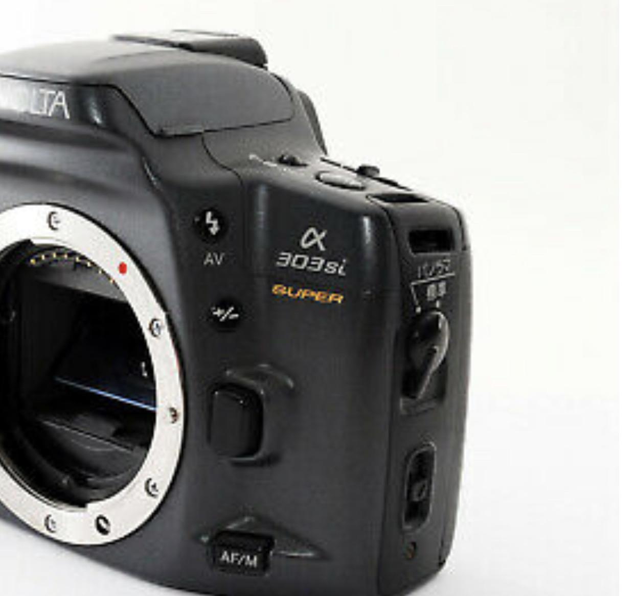 Does someone here know what the switch at the side of Minolta