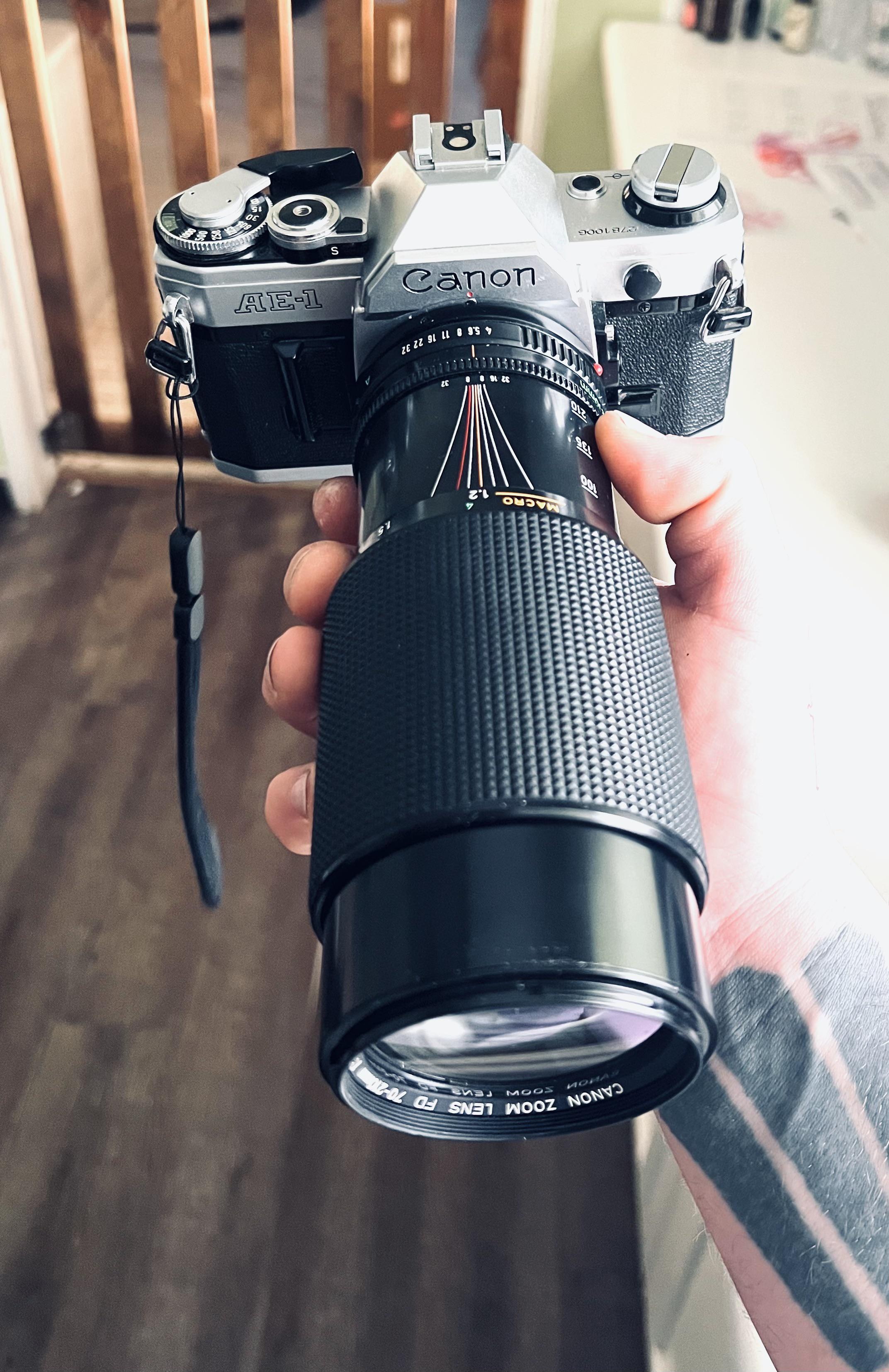 What a beauty. Canon AE-1 with the FD 70-210 lens : r/Cameras