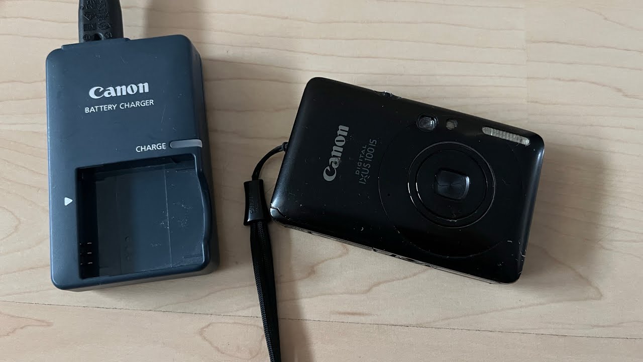 Canon IXUS 100 IS digital retro camera compact device test charger