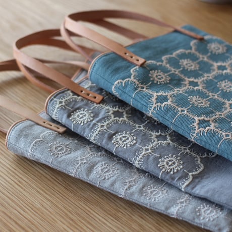 あおりポケットの巾着バッグ＊ミナペルホネン lulu あおりポケットの