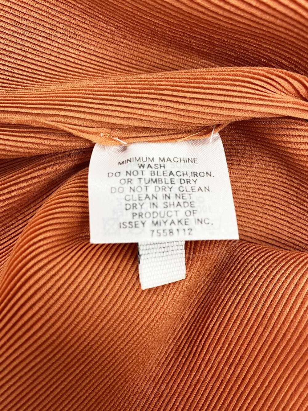 Pleats Please orange pleated top — JAMES VELORIA