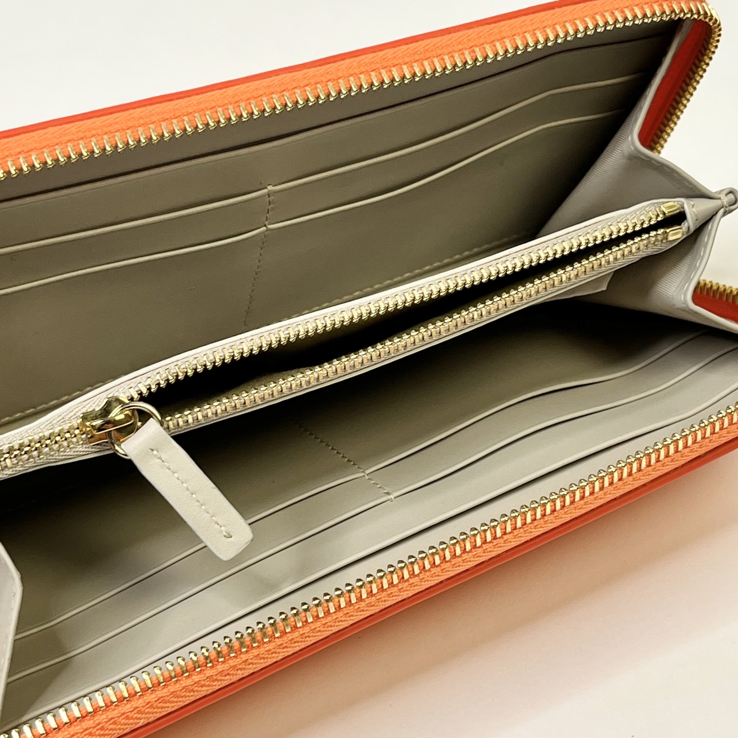 Patek Philippe Orange Saffiano Leather Zip Wallet – Gold Hardware