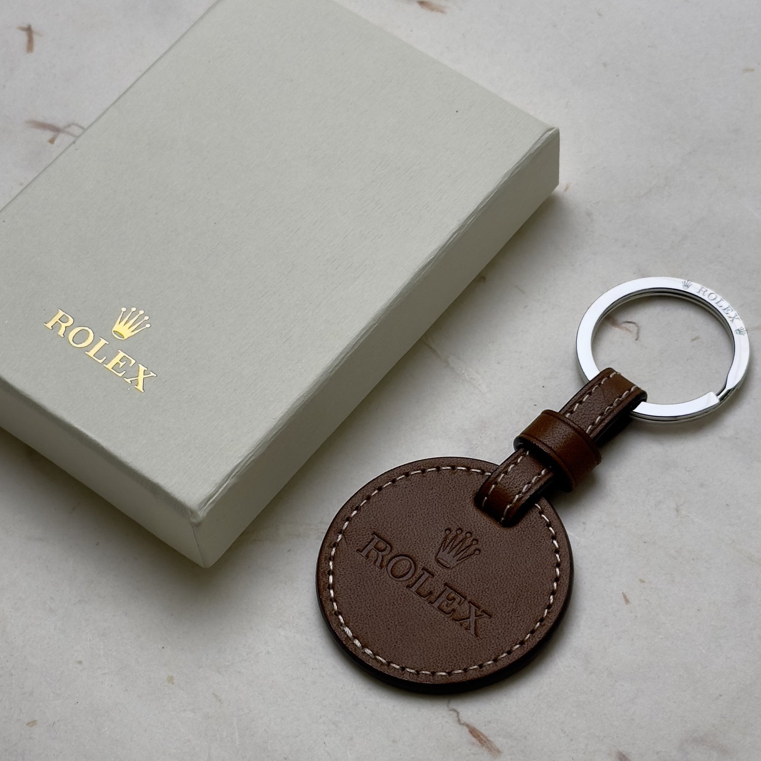 Rolex Brown Leather Keychain - the iconic Rolex logo embossed