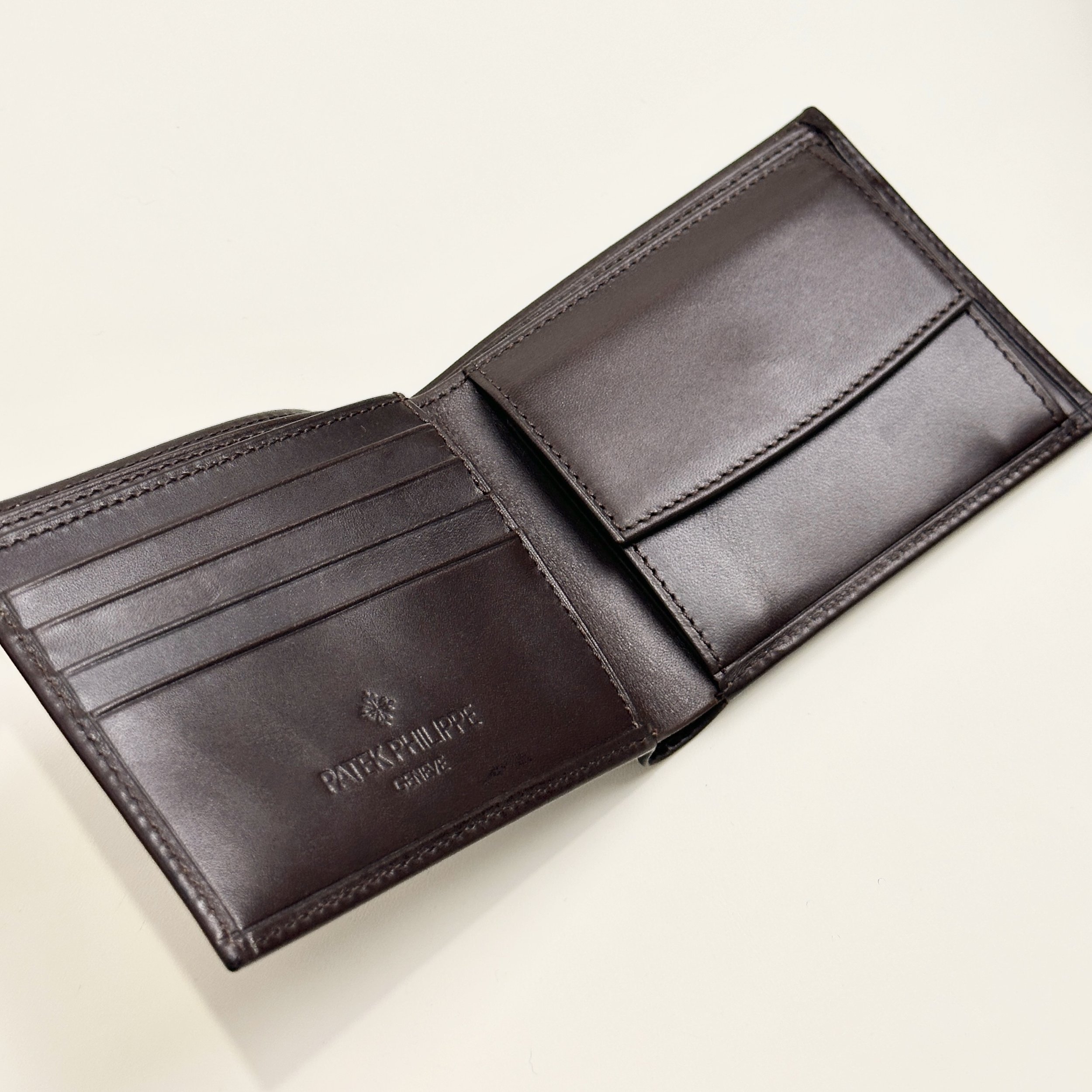 Patek Philippe Brown Leather Bifold Wallet with Embossed Logo